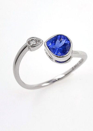 Bague Bague en or blanc tanzanite et diamant. 58 Facettes 40231022