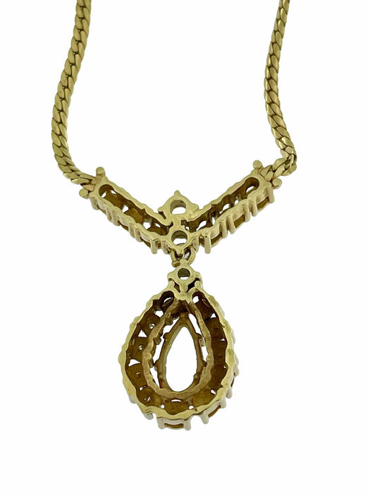 Collier Collier en or blanc et jaune avec diamants et aiguemarine 58 Facettes