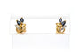 Boucles d'oreilles Boucles d'oreilles contemporaines en or jaune et blanc 18 carats serties de saphirs 58 Facettes 22580