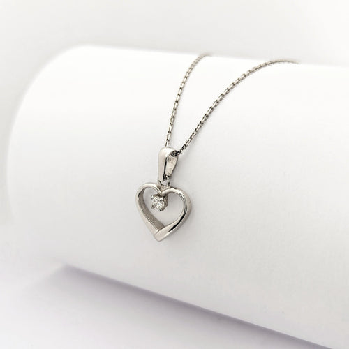 Collier Collier cœur en or blanc et diamant 58 Facettes 30079