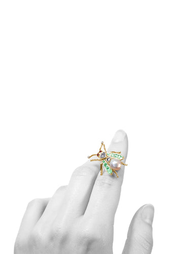 Broche Broche mouche vintage enchanteresse des années 1870 : l'élégance victorienne en or 58 Facettes 24137-0100