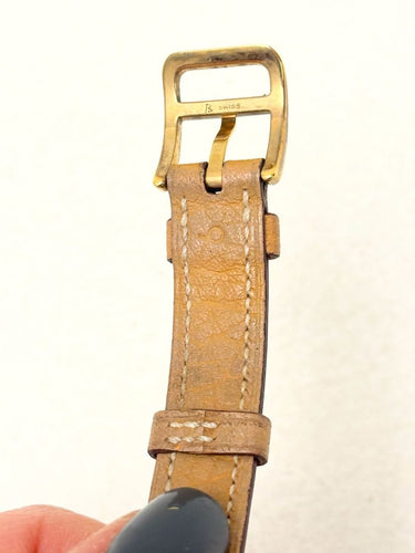 Montre Hermès - Montre Kelly en plaqué or, bracelet cuir camel 58 Facettes WC-2025-2302