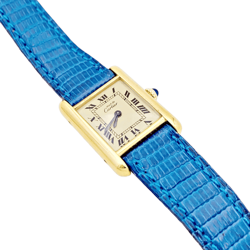 Montre Montre Cartier "Tank Must" argent plaqué or, cuir. 58 Facettes 34339