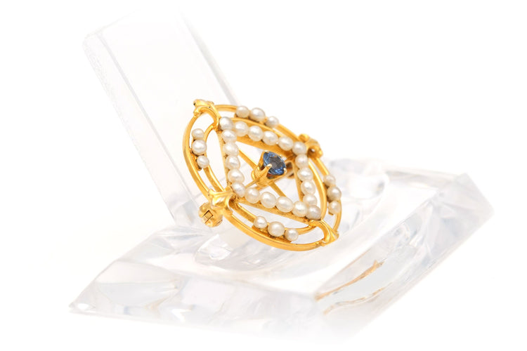 Broche Broche en or jaune sertie d'un saphir et de perles 58 Facettes 22301
