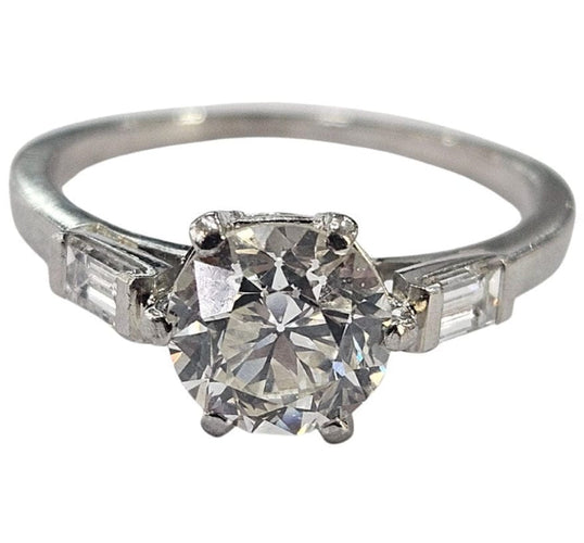 Antiker Platinring um 1920, Altschliff-Diamant 1,25 Karat und zwei Baguette 