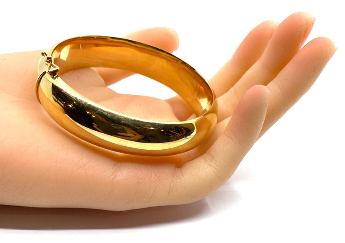 Bracelet Bracelet jonc en or 18 carats ouvrant, modèle lisse. 58 Facettes