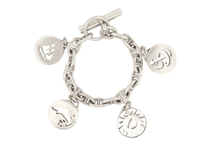 Bracelet vintage bracelet HERMES chaine d'ancre breloques marines t16 en argent 925 58 Facettes 267839