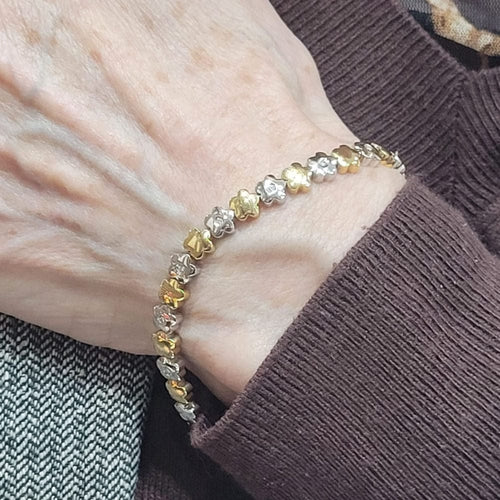 Bracelet Bracelet - Bracelet en or blanc et jaune 18 carats et diamants 58 Facettes P11