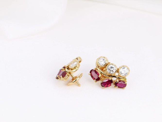 Boucles d'oreilles Boucles d’oreilles vintage en or, diamants et grenats 58 Facettes 391.16