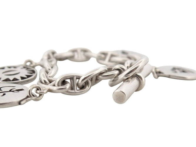 Bracelet vintage bracelet HERMES chaine d'ancre breloques marines t16 en argent 925 58 Facettes 267839