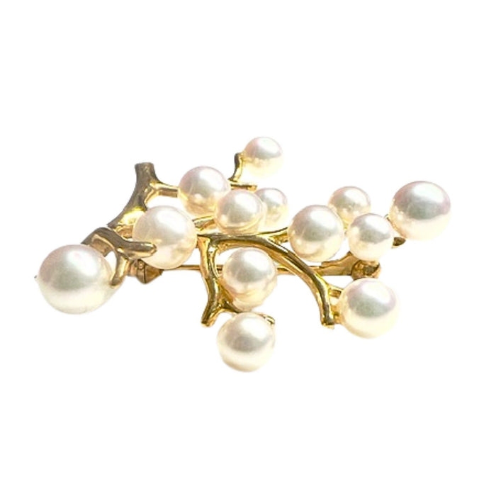 Broche de oro con perlas