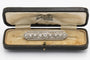 Broche Broche Art Déco en or blanc et platine diamants, années 1930. 58 Facettes 10071