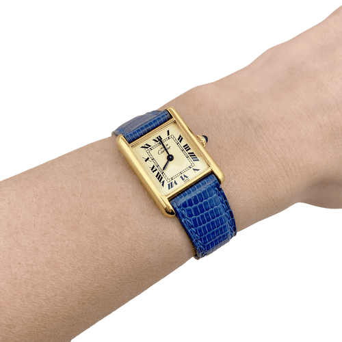 Montre Montre Cartier "Tank Must" argent plaqué or, cuir. 58 Facettes 34339