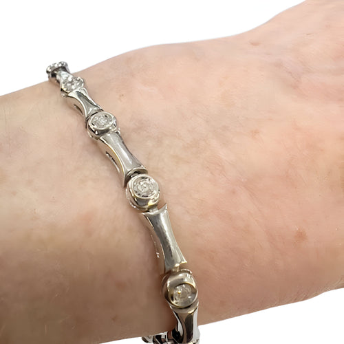 Bracelet Bracelet design contemporain en or avec diamants 58 Facettes Q263B(99)