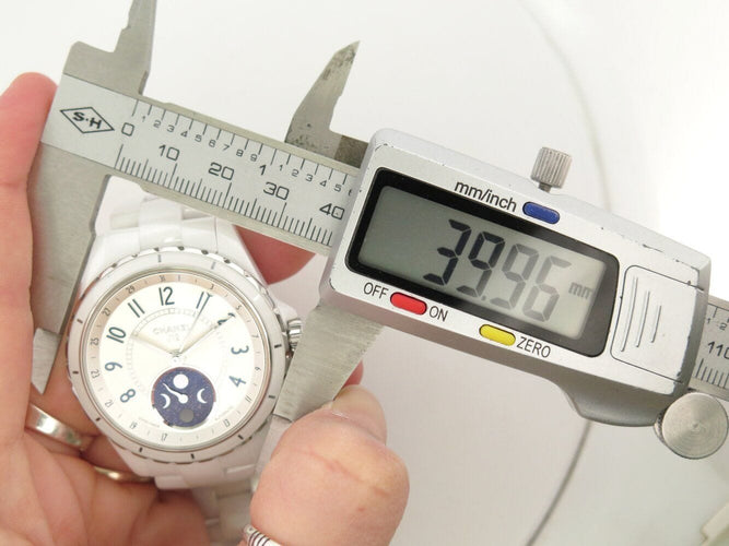 Montre montre CHANEL j12 h3404 automatique moonphase ceramique blanche 58 Facettes 271323