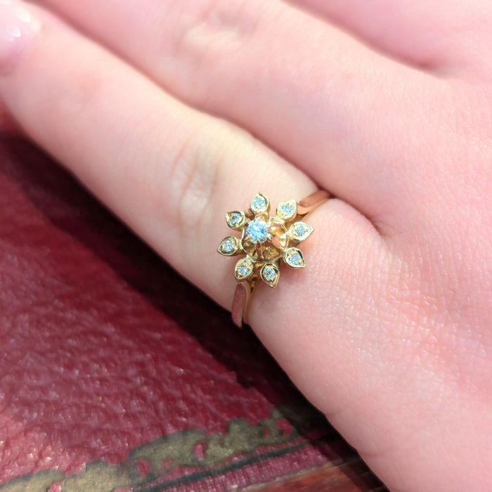 Yellow gold floral ring with diamonds