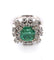 Bague 55 Magnifique bague en or blanc avec une émeraude centrale et des diamants tout autour. 58 Facettes