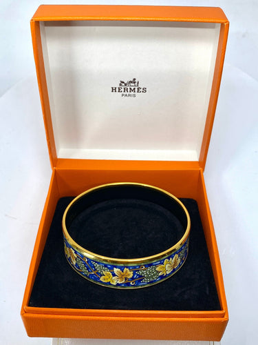 Bracelet HERMÈS - bracelet en métal doré et émail 58 Facettes AB657