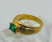 Bague 59 Bague en or jaune avec une émeraude centrale et des diamants. 58 Facettes 50251
