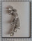 Broche Élégance intemporelle : platine et diamants des années 1950 58 Facettes 21348-0038