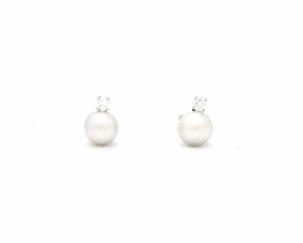Boucles d'oreilles Boucles d'oreilles en or blanc ornées de perles australiennes et de diamants 58 Facettes 5906