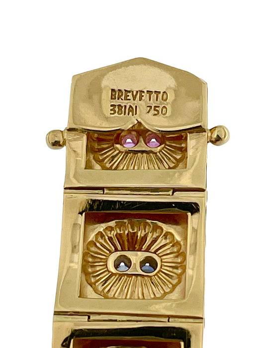 Brazalete Brevetto retro en oro amarillo, rubíes y zafiros