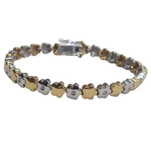 Bracelet Bracelet - Bracelet en or blanc et jaune 18 carats et diamants 58 Facettes P11