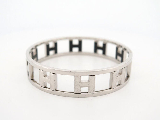 Bracelet bracelet HERMES rondo ash h rotatifs 20cm acier paladie & laque noir 58 Facettes 264585