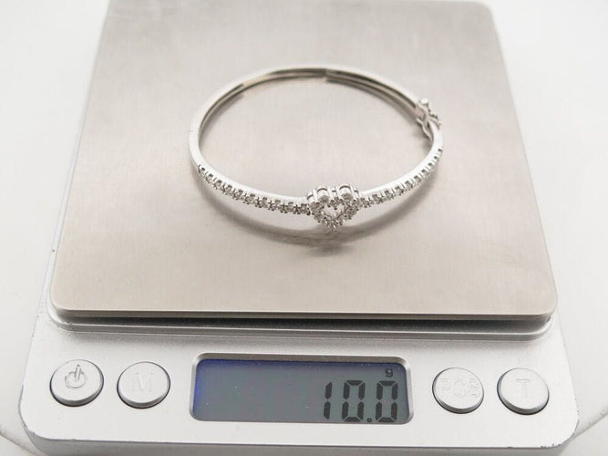 Bracelet bracelet jonc coeur serti 30 diamants 1.55ct t15 or blanc 18k 10gr 58 Facettes 267662