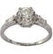 Bague 51 Bague ancienne en platine, vers 1920, sertie d'un diamant taille ancienne de 1,25 carat et de deux diamants baguette. 58 Facettes E42