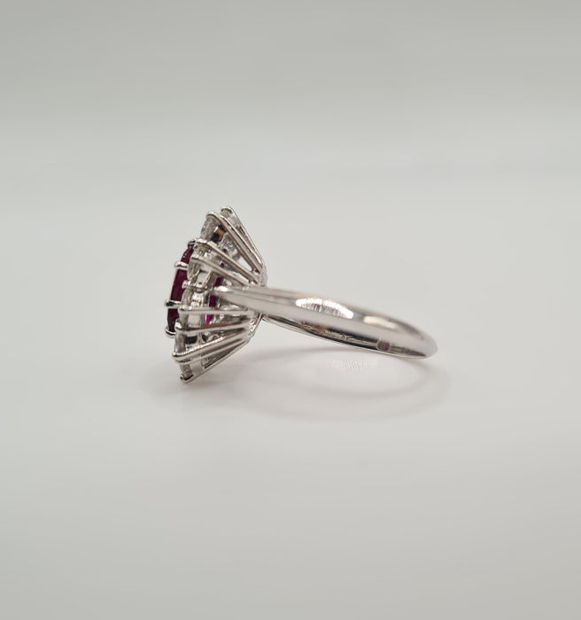 White gold ring set with a ruby and diamonds