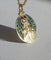 Pendentif Becker - Médaille pendentif Jésus Christ émail plique-à-jour en or jaune 18k 58 Facettes
