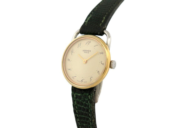 Montre vintage montre HERMES arceau plaque or 25 mm bracelet lezard quartz lady 58 Facettes 267938
