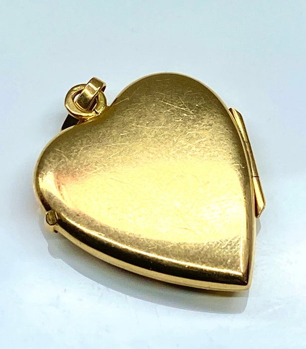 Pendentif coeur ouvrant en or jaune 18 carats 58 Facettes AB452