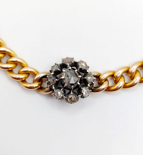 Bracelet Bracelet or jaune et argent, marguerite ornée de diamants 58 Facettes A05479