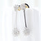 Boucles d'oreilles Longues boucles d'oreilles en or blanc 18 carats ornées de rosettes de diamants 58 Facettes VV1-F