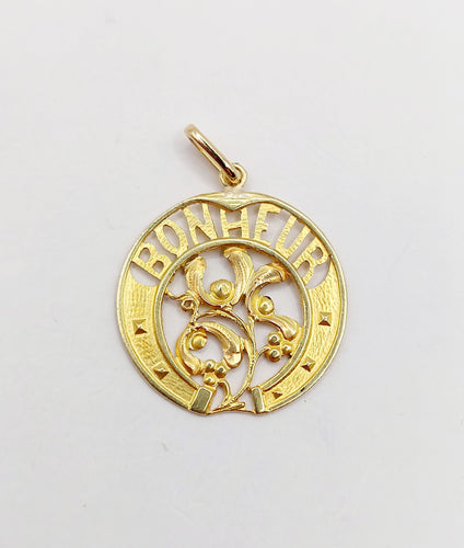 Pendentif Pendentif Art Nouveau or jaune BONHEUR fer à cheval et branche de gui (circa 1920) 58 Facettes A06259
