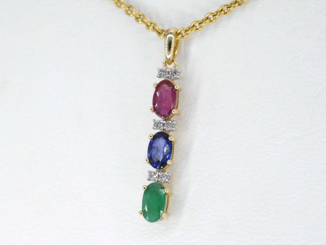 Pendentif Pendentif en or jaune avec pierres précieuses multicolores et diamants 58 Facettes 2277