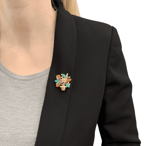 “Fleurs”系列胸针，黄金、钻石、红宝石、彩色宝石。 