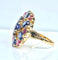 54 Importante bague or jaune, 7 saphirs et 6 rubis 58 Facettes AB454