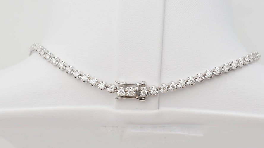 Collier 44.5 Collier rivière en or blanc et diamants 58 Facettes 32532