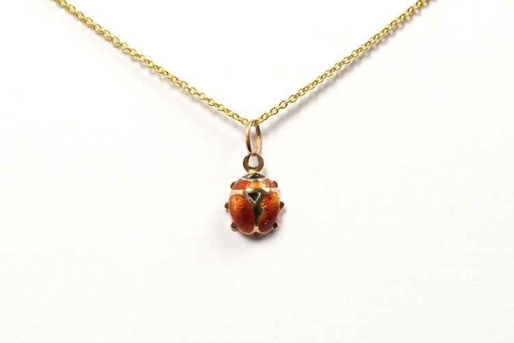 Pendentif Pendentif années 70 or jaune serti d'émail 58 Facettes 21640