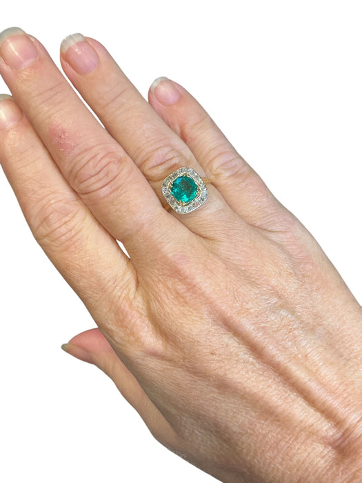 yellow gold emerald ring with diamond paving