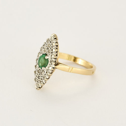 Bague 54 Bague marquise en or jaune et or blanc, émeraude et diamants 58 Facettes B250584