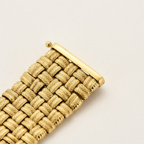 Bracelet Large bracelet tressé en or jaune 58 Facettes LOR3435