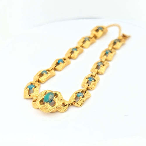 Bracelet Bracelet en or jaune et turquoises 58 Facettes 27765