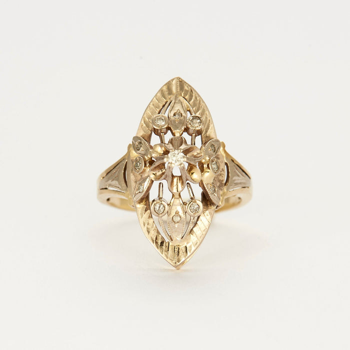 Yellow gold and white diamond marquise ring