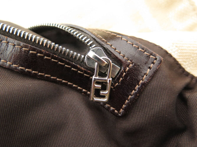 sac a main FENDI baguette en toile jacquard ff zucca beige 26424 hand bag 58 Facettes 270643