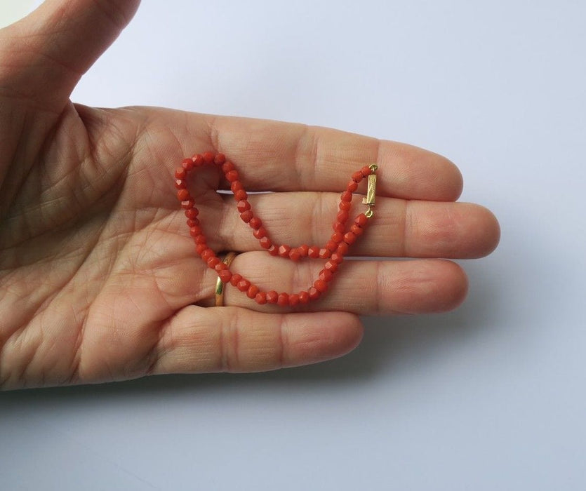 Bracelet Bracelet XIXe corail facetté fermoir or rose 58 Facettes