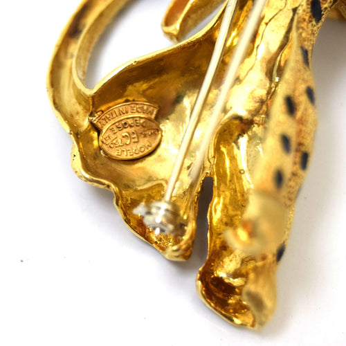 Broche Broche vintage en or jaune avec rubis 58 Facettes